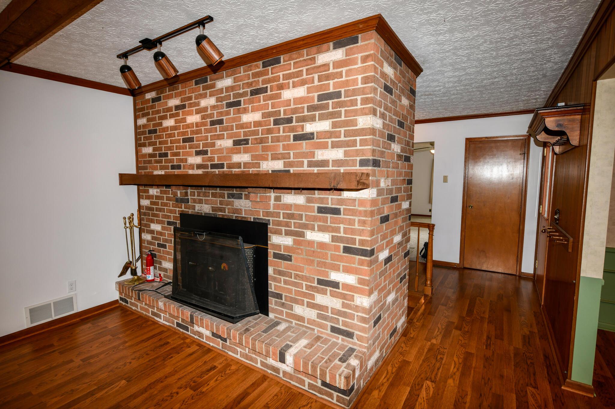 15743 Hagenderfer Road Plain City, OH 43064 - Photo 16 of 49 Hand Hewn Mantel and Bench Hearth
