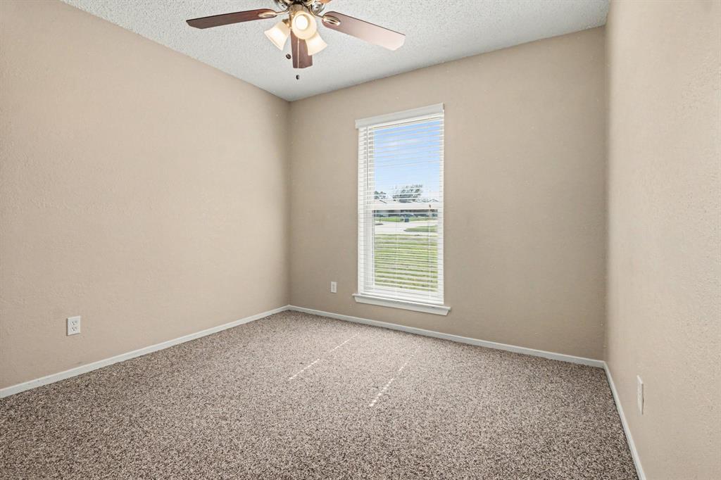 1024 South Riverside Drive Grapevine, TX 76051 - Photo 14 of 21 an empty room with a window