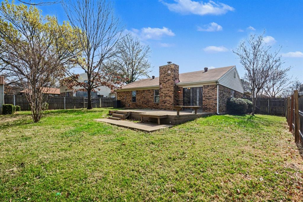 1024 South Riverside Drive Grapevine, TX 76051 - Photo 18 of 21 a view of a house with a yard
