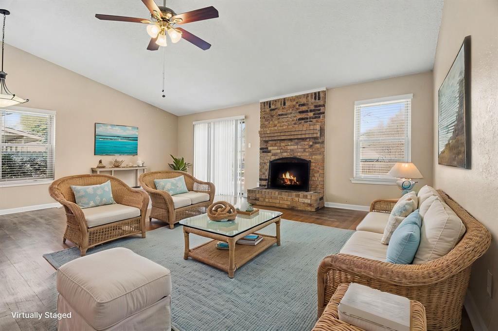 1024 South Riverside Drive Grapevine, TX 76051 - Photo 4 of 21 a living room with furniture and a fireplace