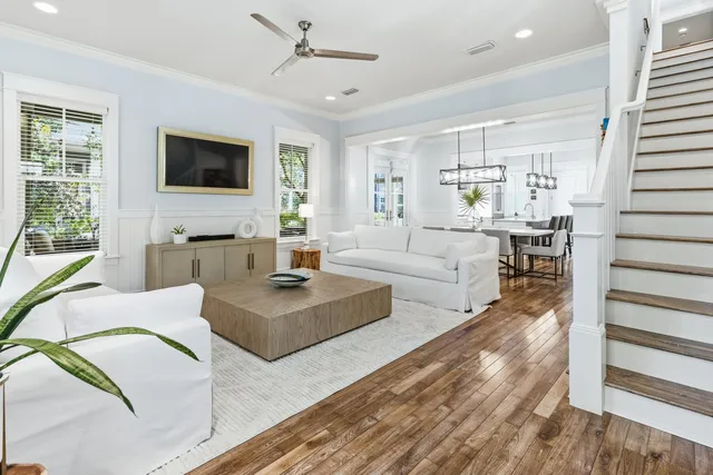 a living room with furniture fireplace and a flat screen tv