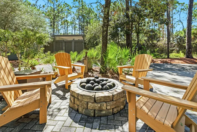a bedroom with a large bed and a couch