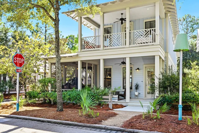 an aerial view of a residential houses with outdoor space