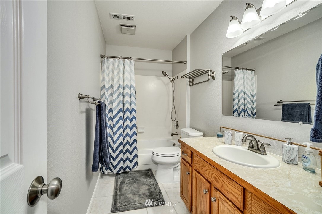 1912 169th Place Southeast Bothell, WA 98012 - Photo 26 of 40 a bathroom with a sink toilet and shower