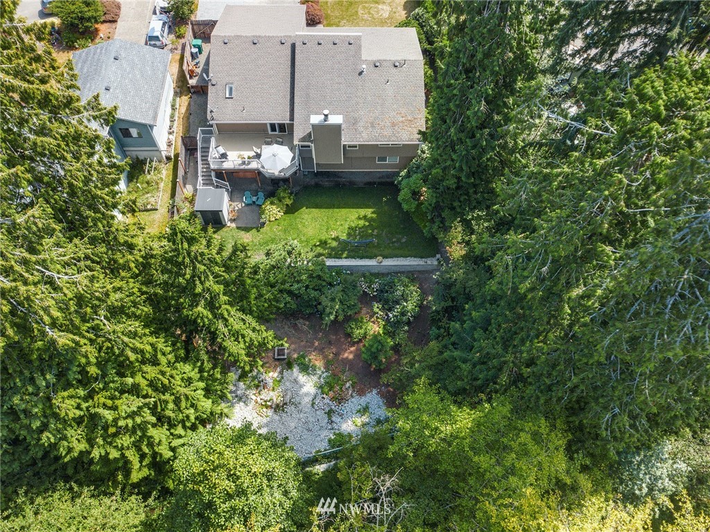 1912 169th Place Southeast Bothell, WA 98012 - Photo 33 of 40 an aerial view of a house with a yard basket ball court and outdoor seating