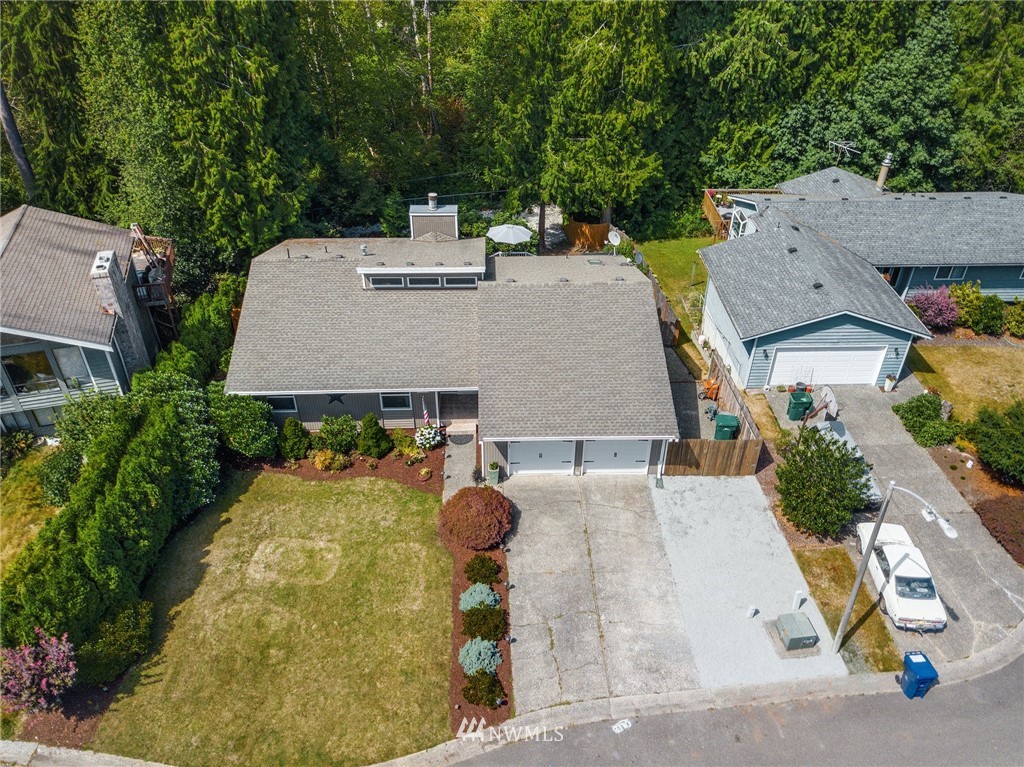 1912 169th Place Southeast Bothell, WA 98012 - Photo 35 of 40 an aerial view of a house with swimming pool and patio