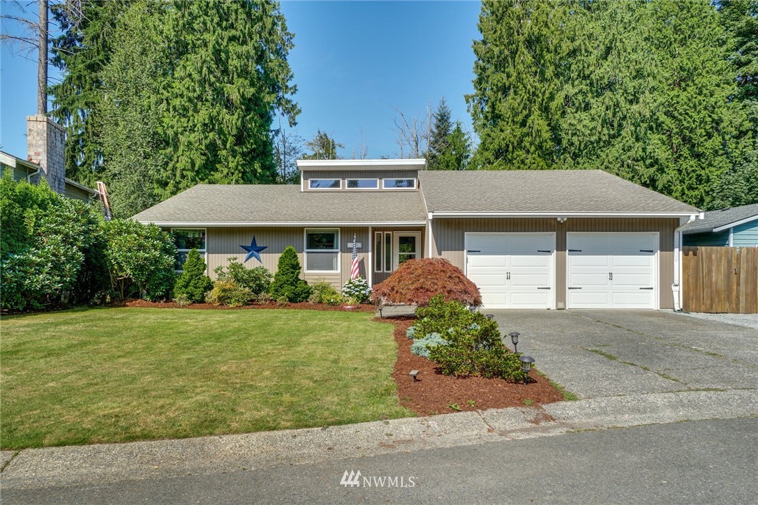 1912 169th Place Southeast Bothell, WA 98012 - Photo 39 of 40 front view of a house with a yard