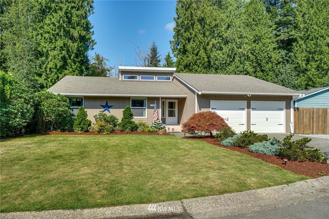 1912 169th Place Southeast Bothell, WA 98012 - Photo 40 of 40 a front view of a house with garden