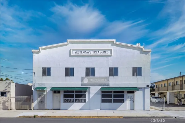 a view of a building with a street