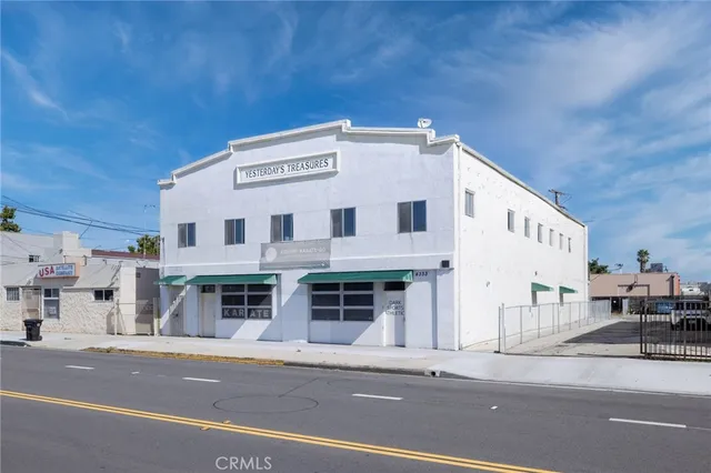 a view of a house with a street