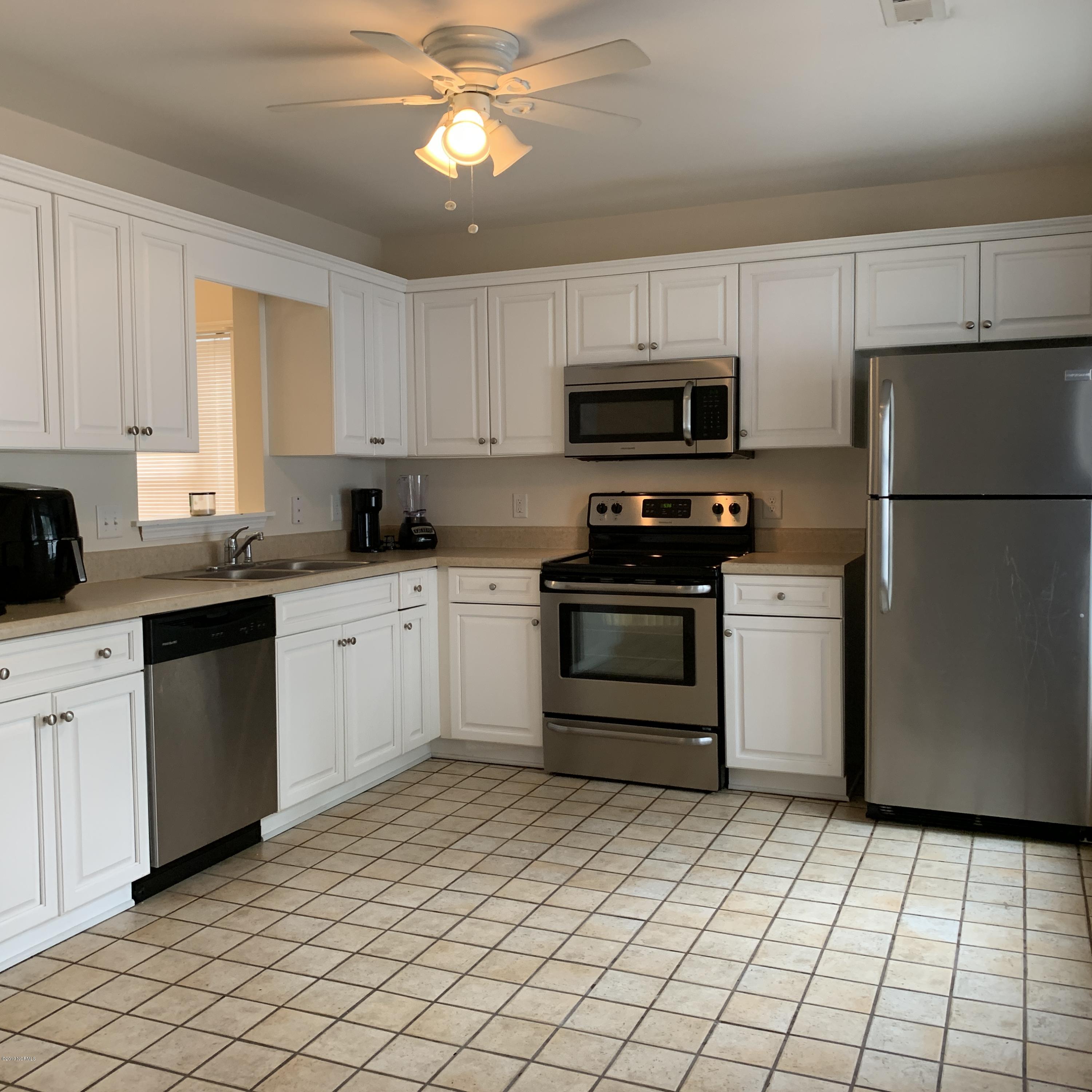 4910 Bridger Road, Unit #14 Shallotte, NC 28470 - Photo 11 of 37 Spacious Kitchen