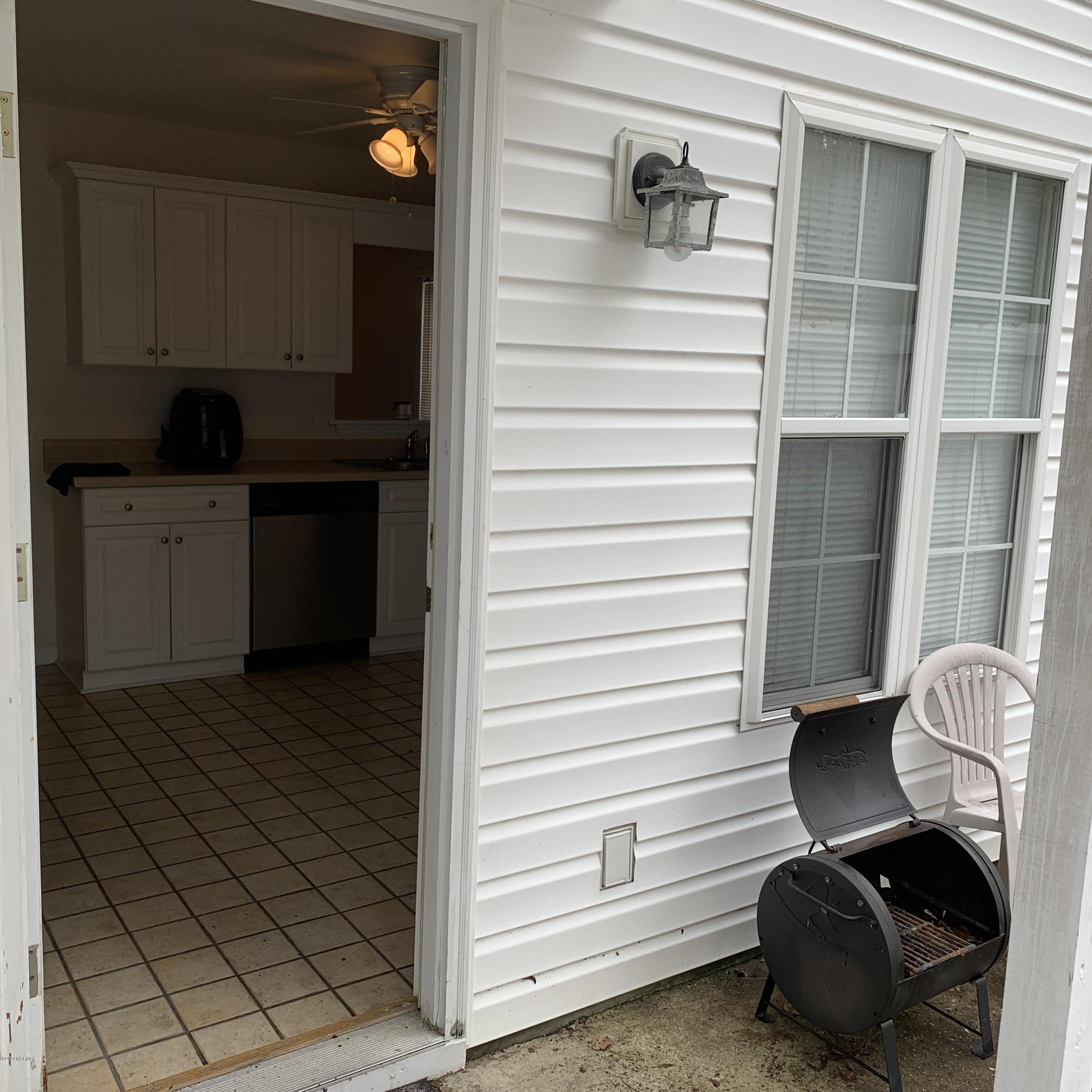 4910 Bridger Road, Unit #14 Shallotte, NC 28470 - Photo 13 of 37 Backyard off Kitchen