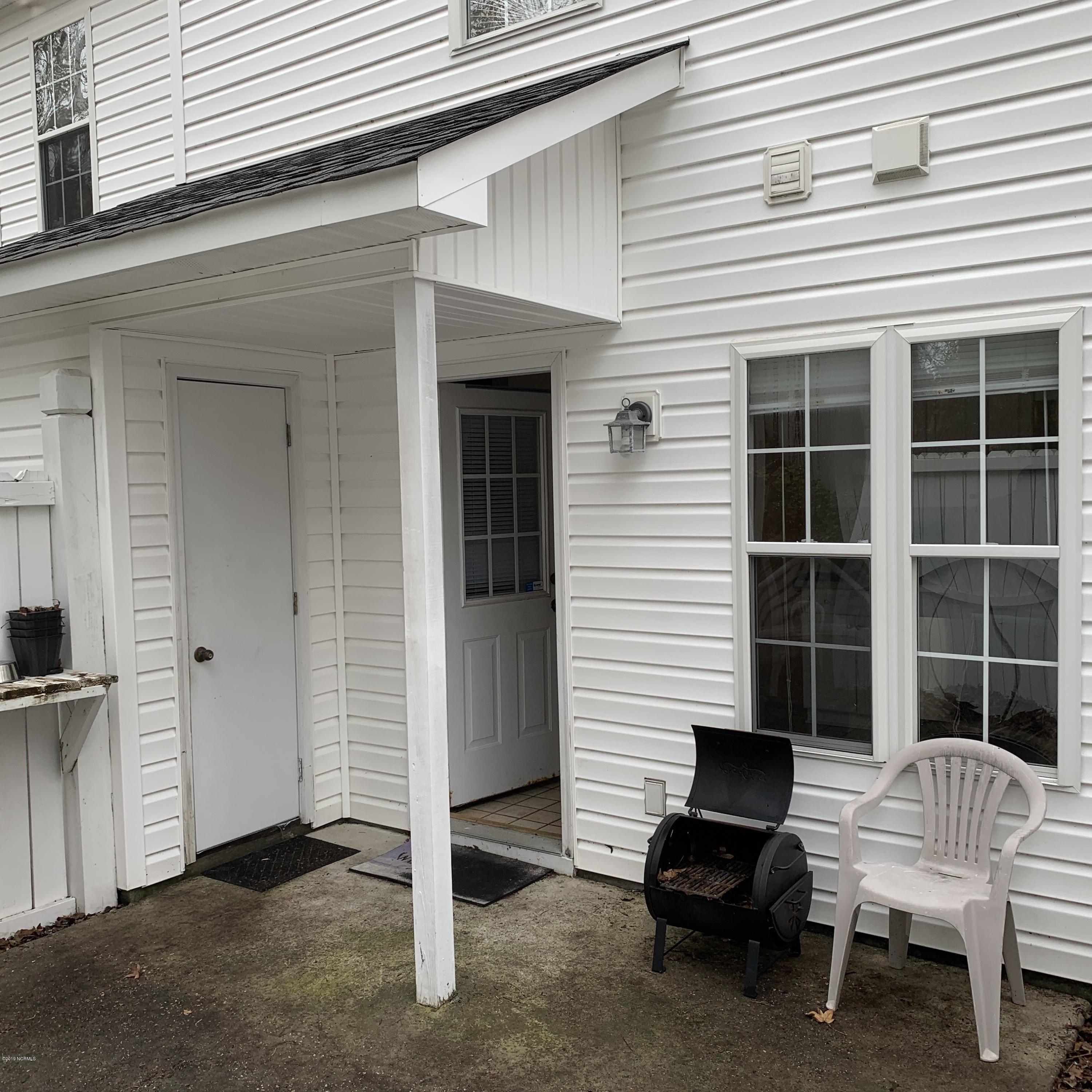 4910 Bridger Road, Unit #14 Shallotte, NC 28470 - Photo 15 of 37 Backyard storage