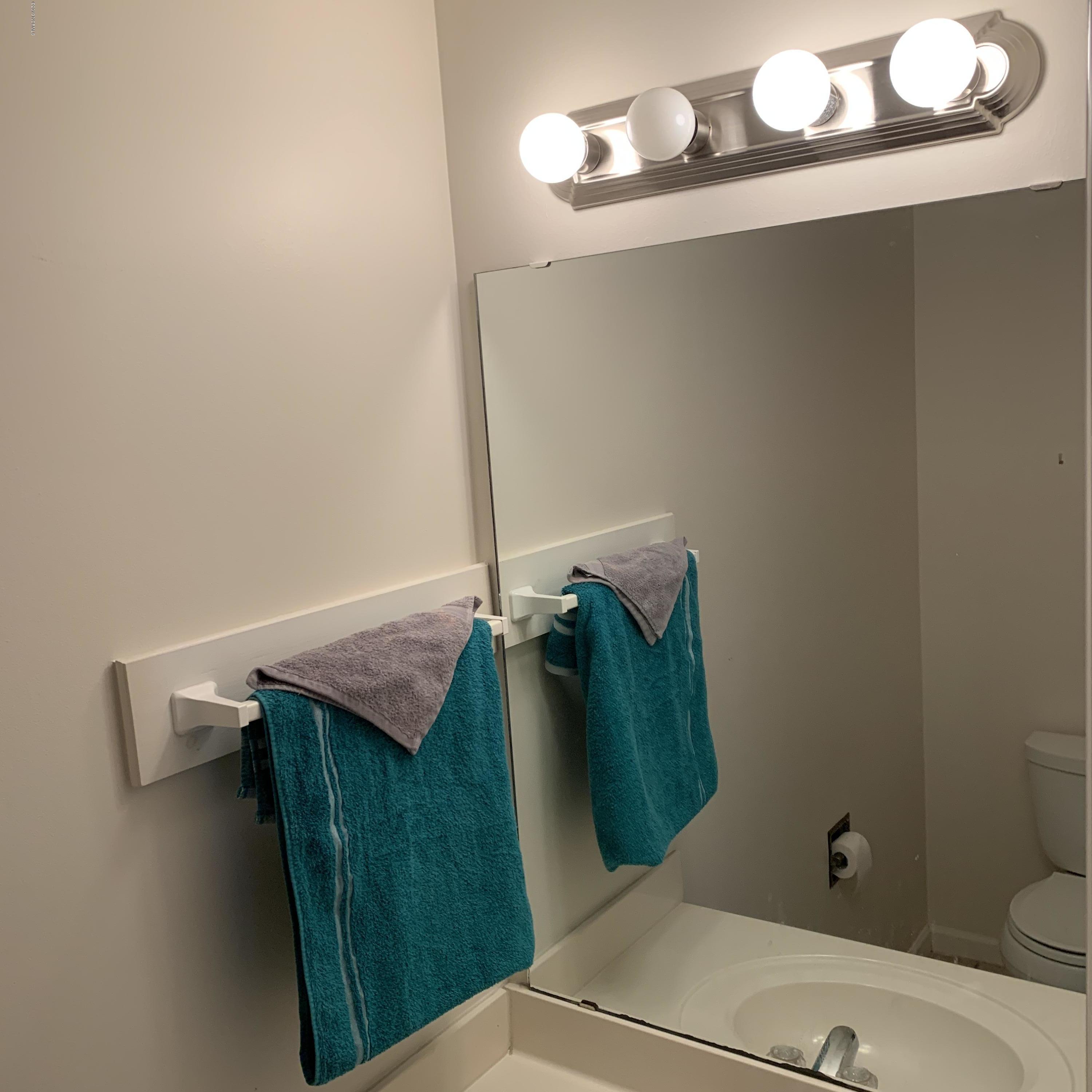 4910 Bridger Road, Unit #14 Shallotte, NC 28470 - Photo 17 of 37 First Floor 1/2 Bath