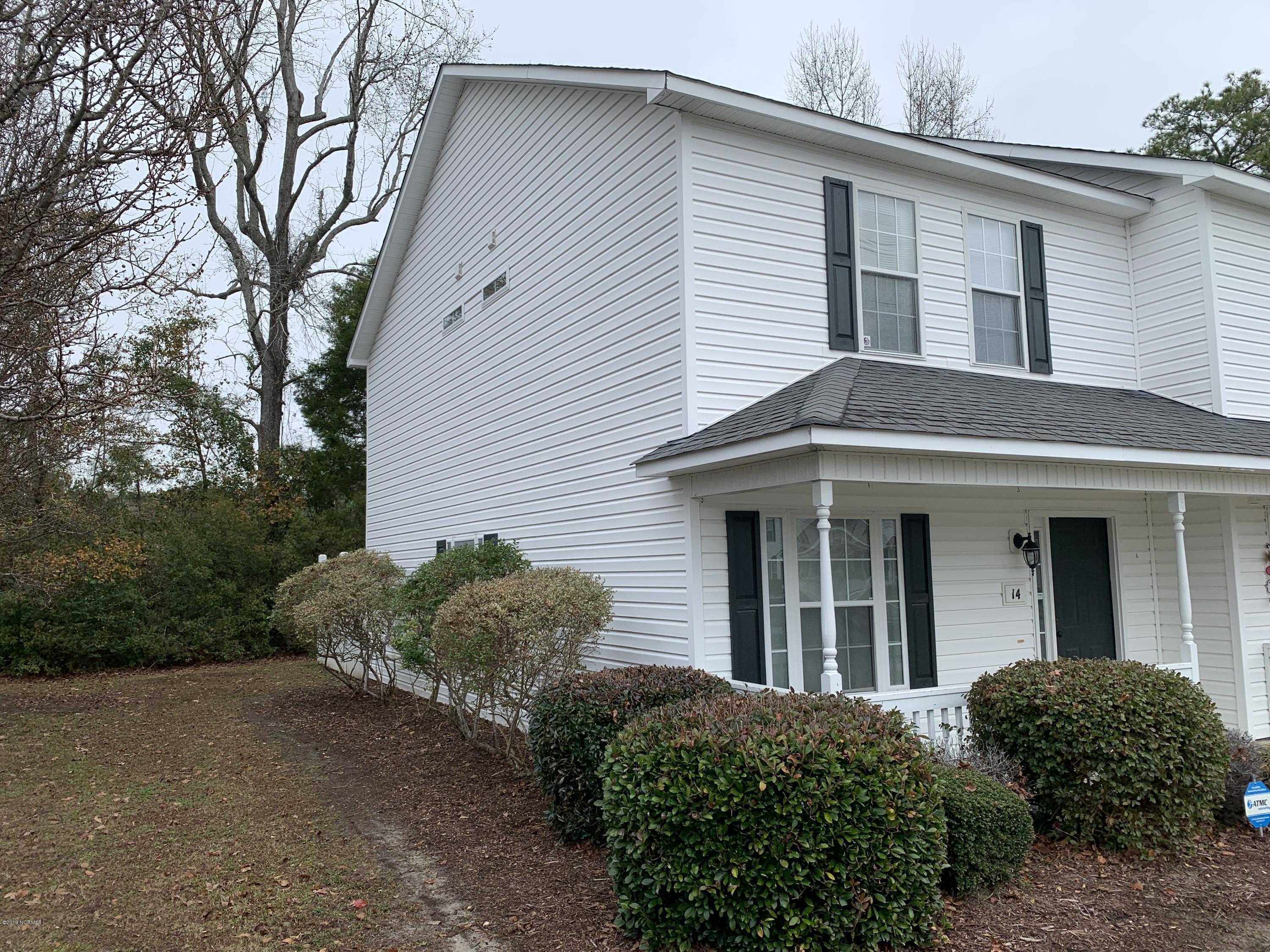 4910 Bridger Road, Unit #14 Shallotte, NC 28470 - Photo 4 of 37 End Unit has Two Transom Window in both Up Stairs Full Bathrooms