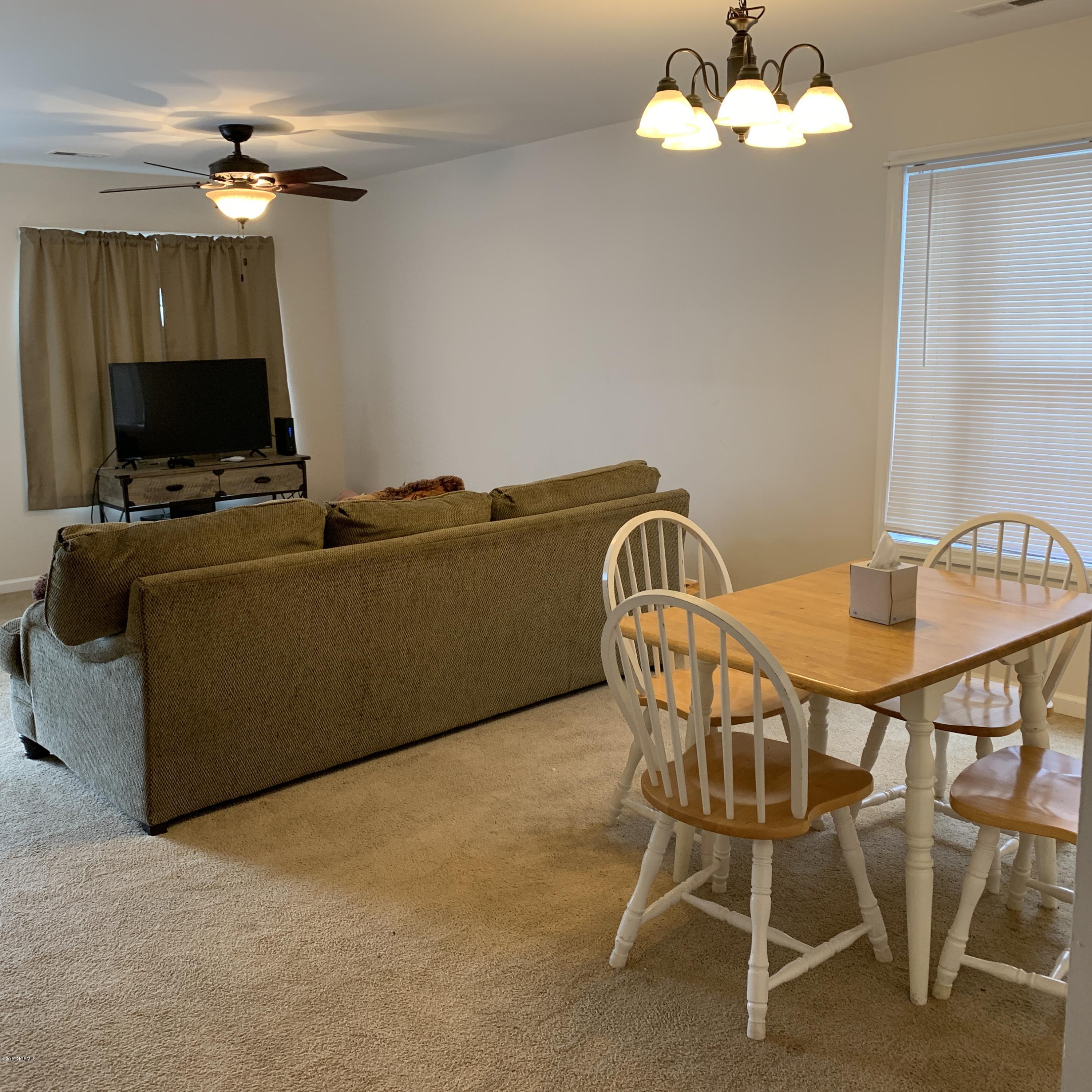4910 Bridger Road, Unit #14 Shallotte, NC 28470 - Photo 10 of 37 Dining Area with side Window