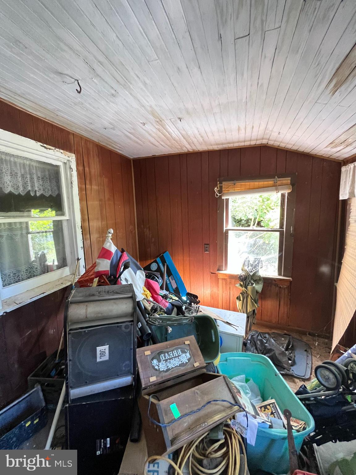 484 Gum Tree Corner Road Bridgeton, NJ 08302 - Photo 15 of 29 a living room with furniture a flat screen tv and a window