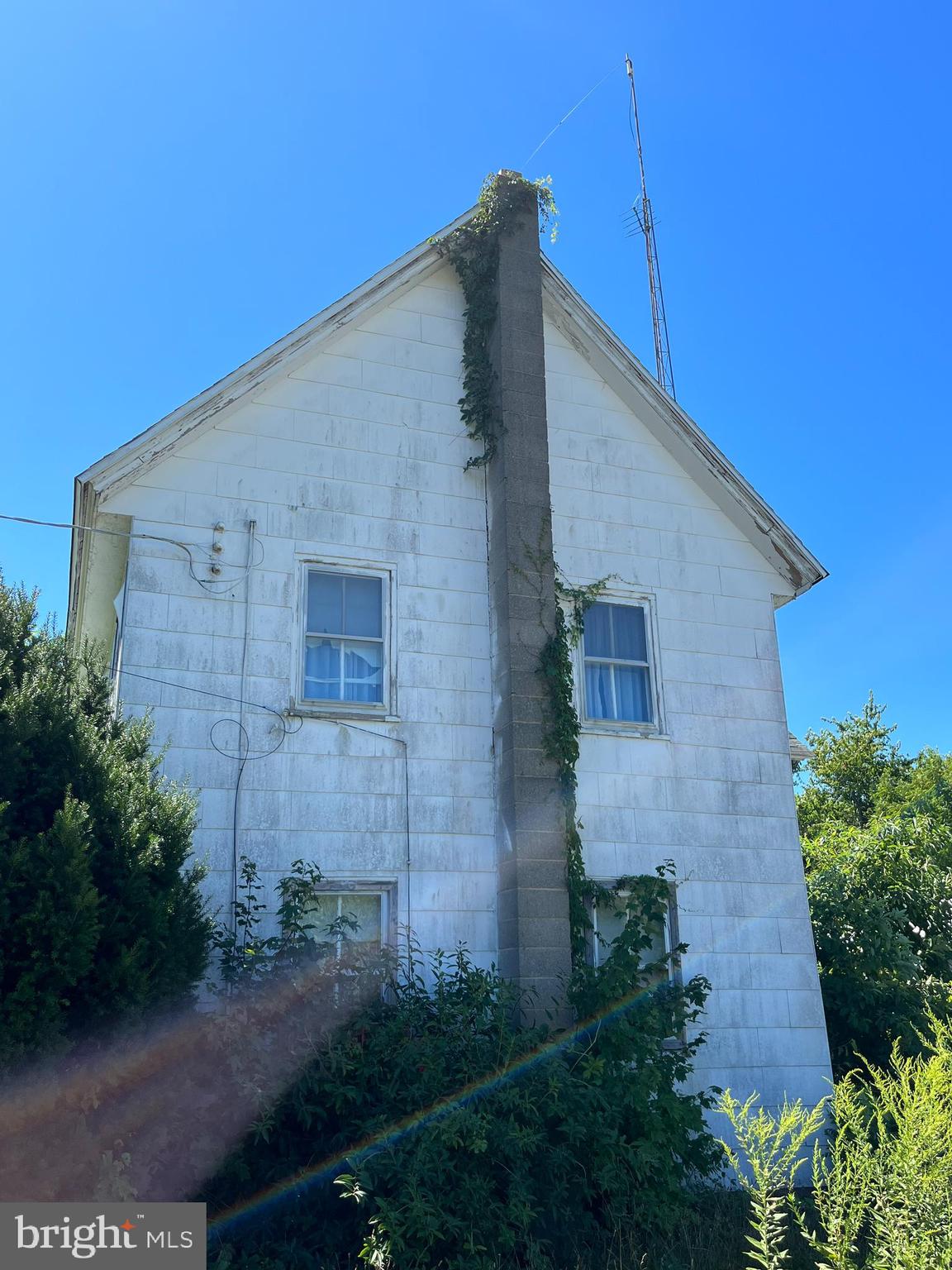 484 Gum Tree Corner Road Bridgeton, NJ 08302 - Photo 19 of 29 a brick house with a yard
