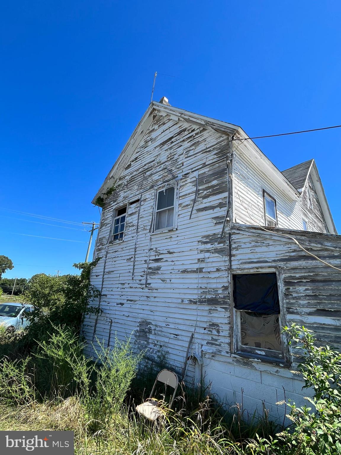 484 Gum Tree Corner Road Bridgeton, NJ 08302 - Photo 23 of 29 a view of a stone house with a yard