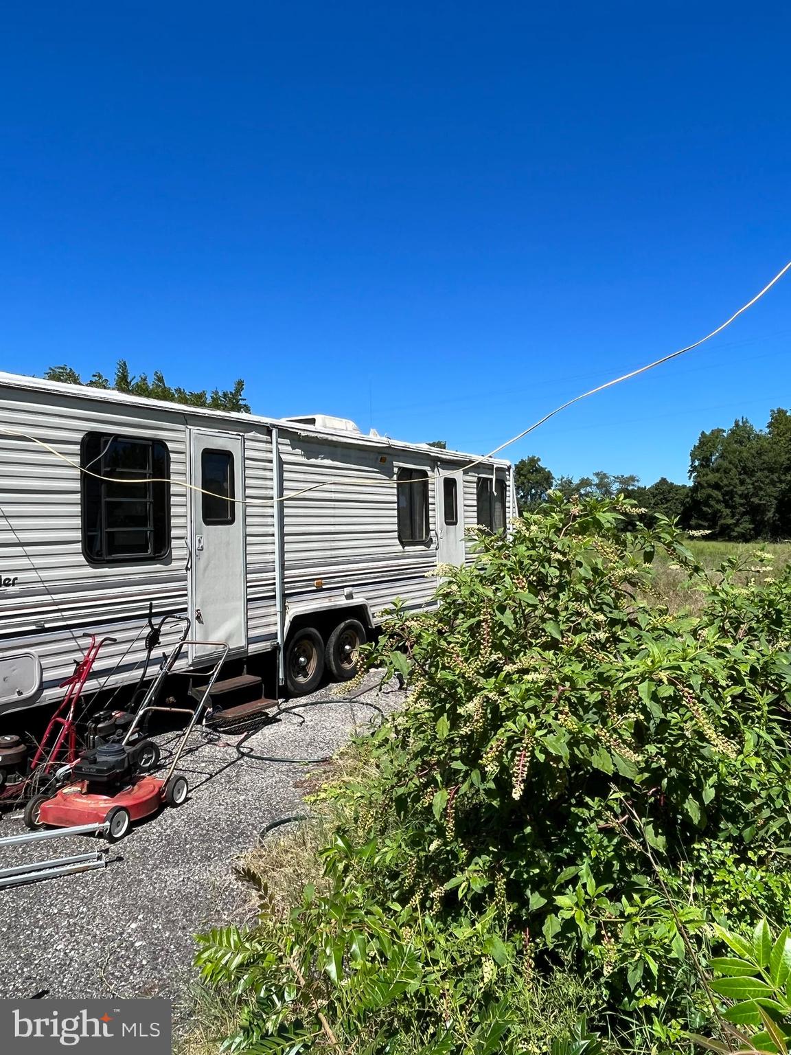 484 Gum Tree Corner Road Bridgeton, NJ 08302 - Photo 25 of 29 a view of a house with a backyard space and balcony