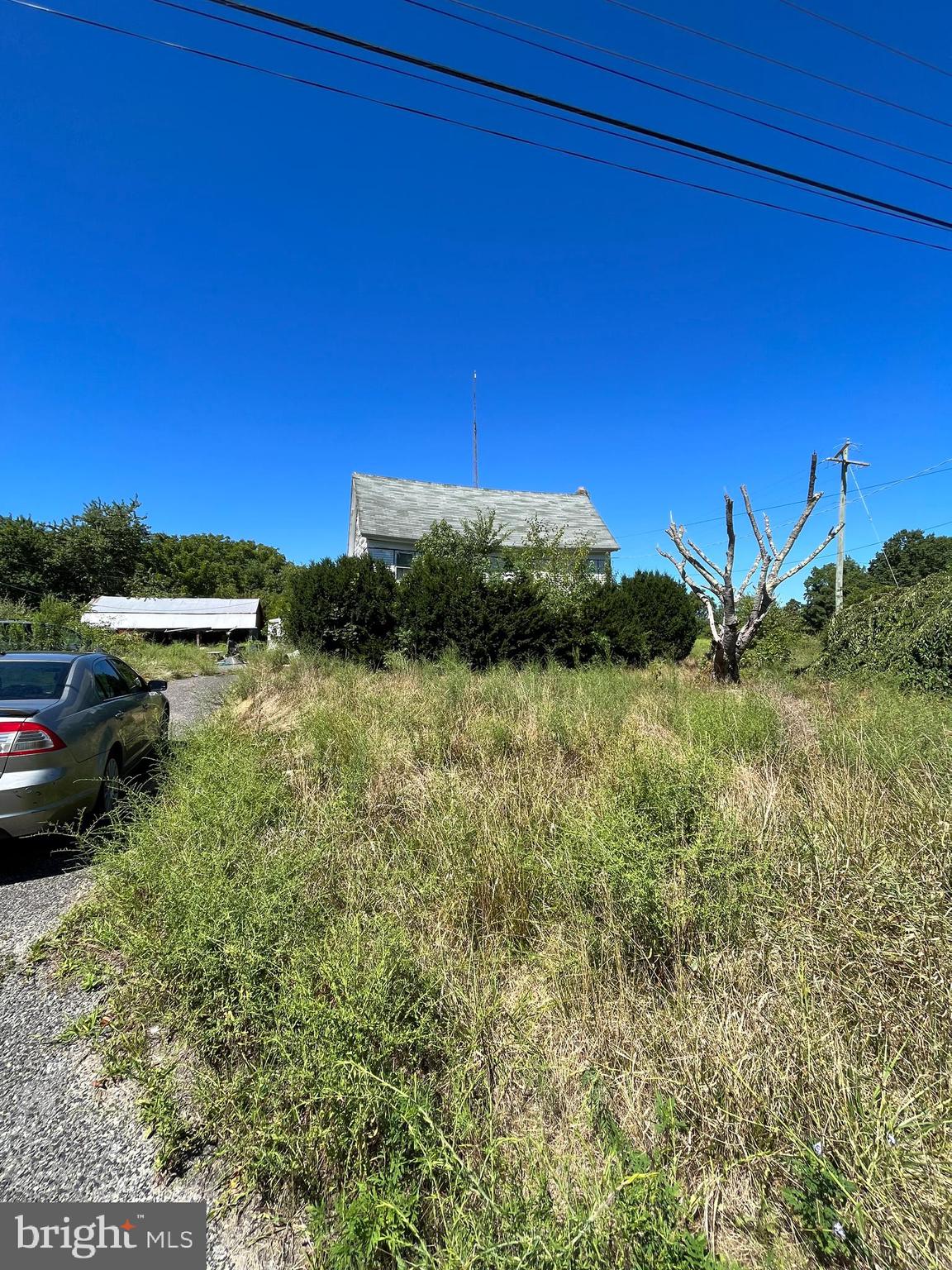 484 Gum Tree Corner Road Bridgeton, NJ 08302 - Photo 28 of 29 a view of a lake with a yard
