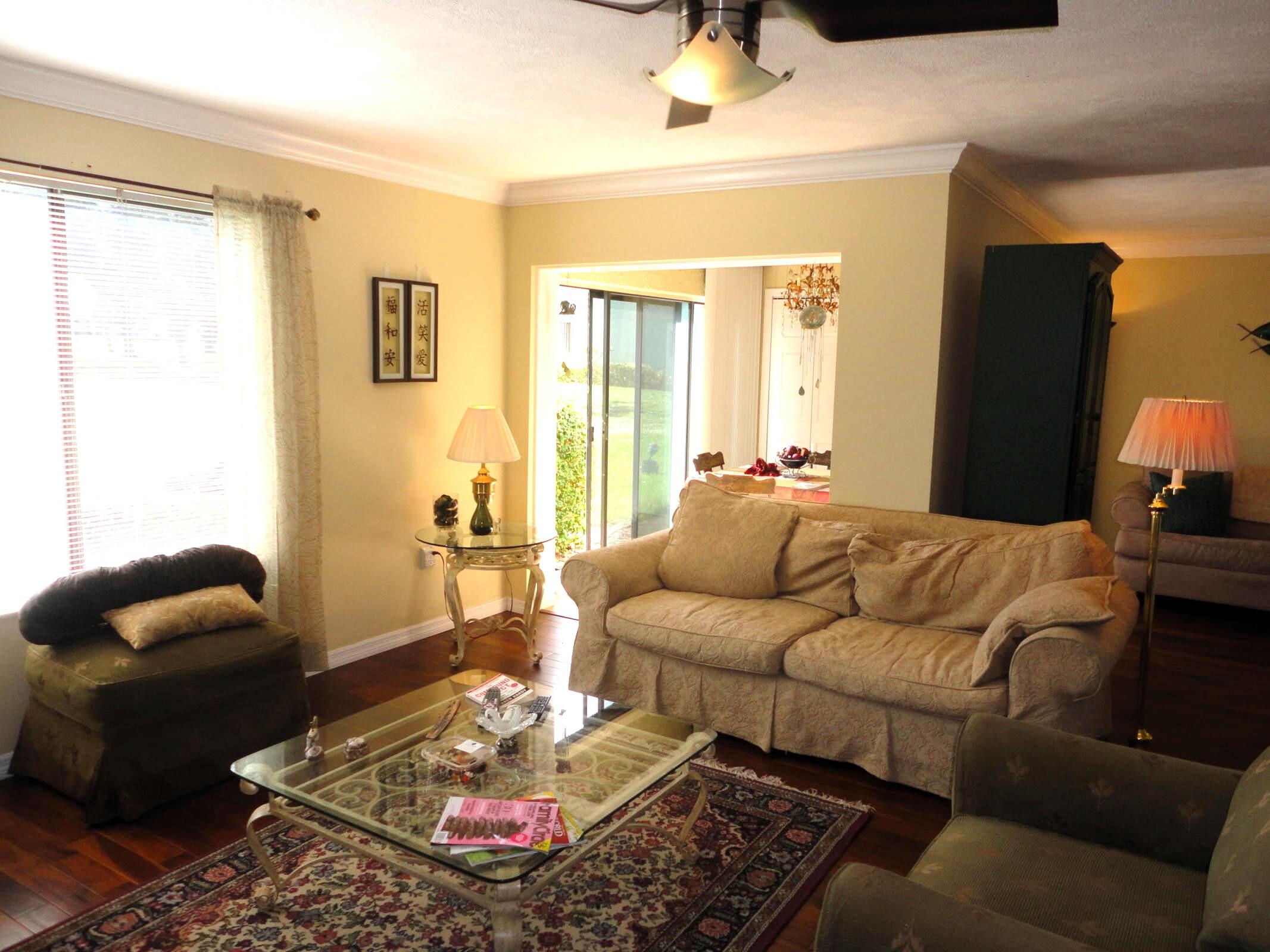 5433 Southeast Miles Grant Road, Unit 104 Stuart, FL 34997 - Photo 5 of 16 Living room 2