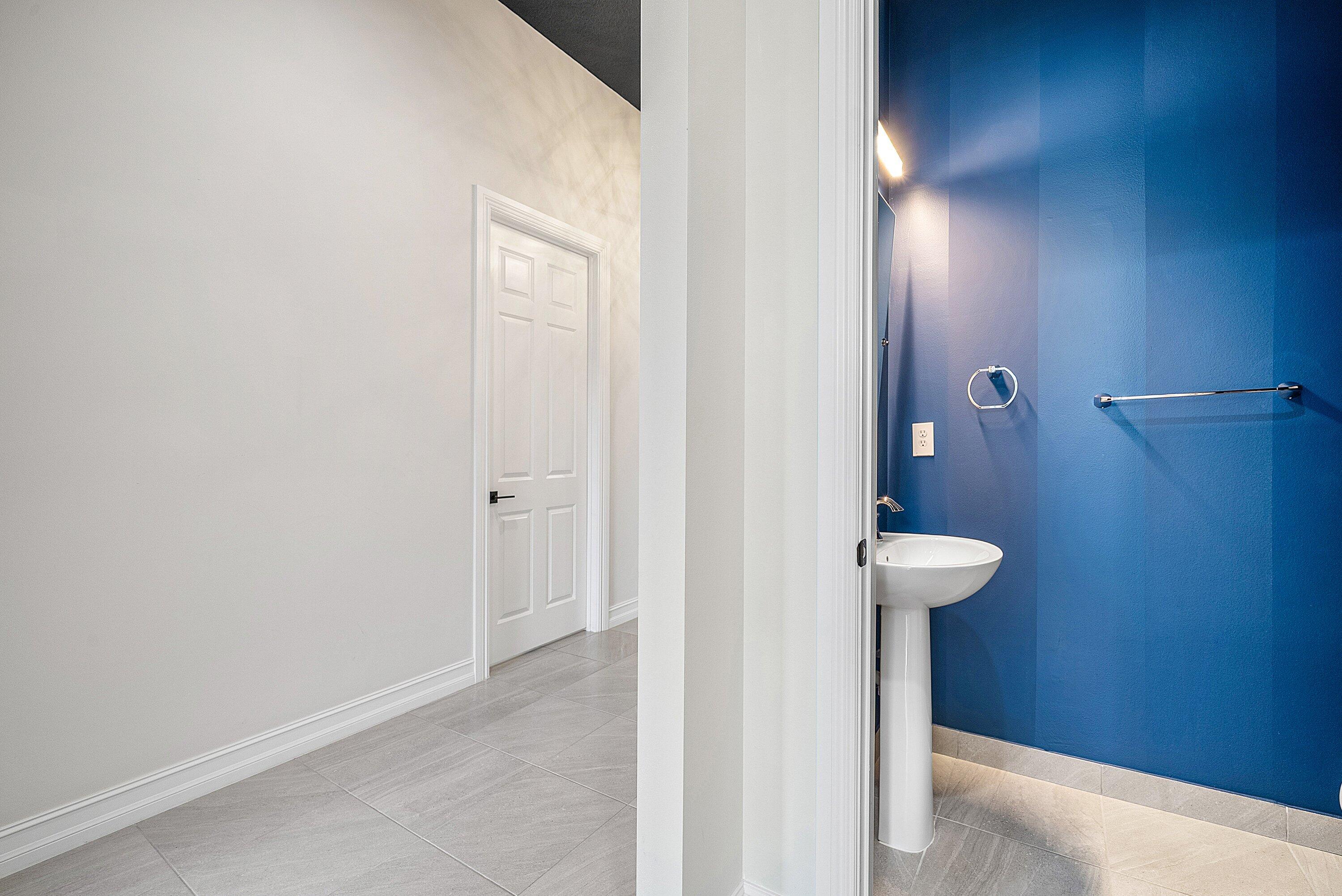 9076 Leon Circle Parkland, FL 33076 - Photo 32 of 42 a view of a bathroom with a sink