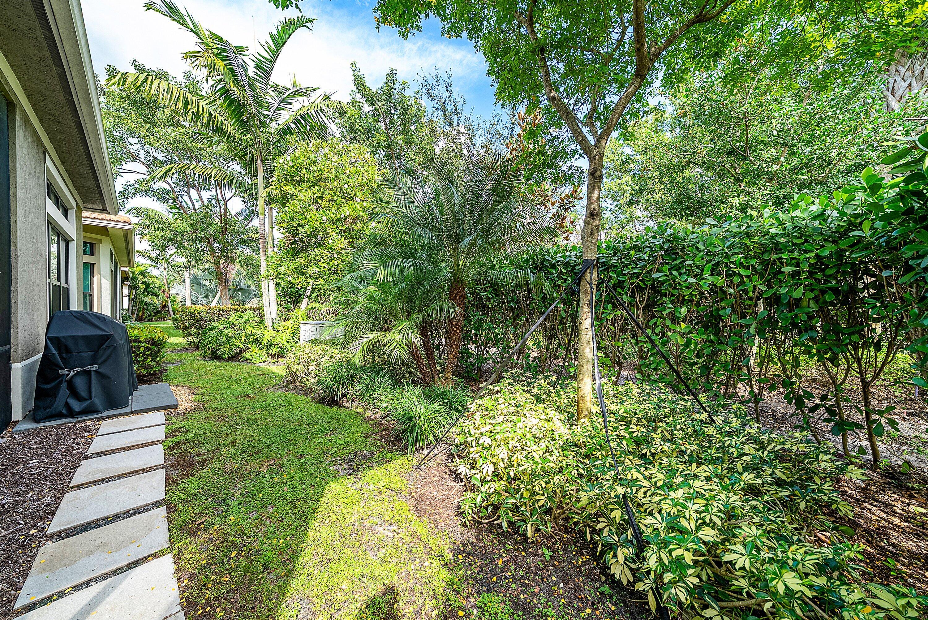 9076 Leon Circle Parkland, FL 33076 - Photo 38 of 42 a garden view