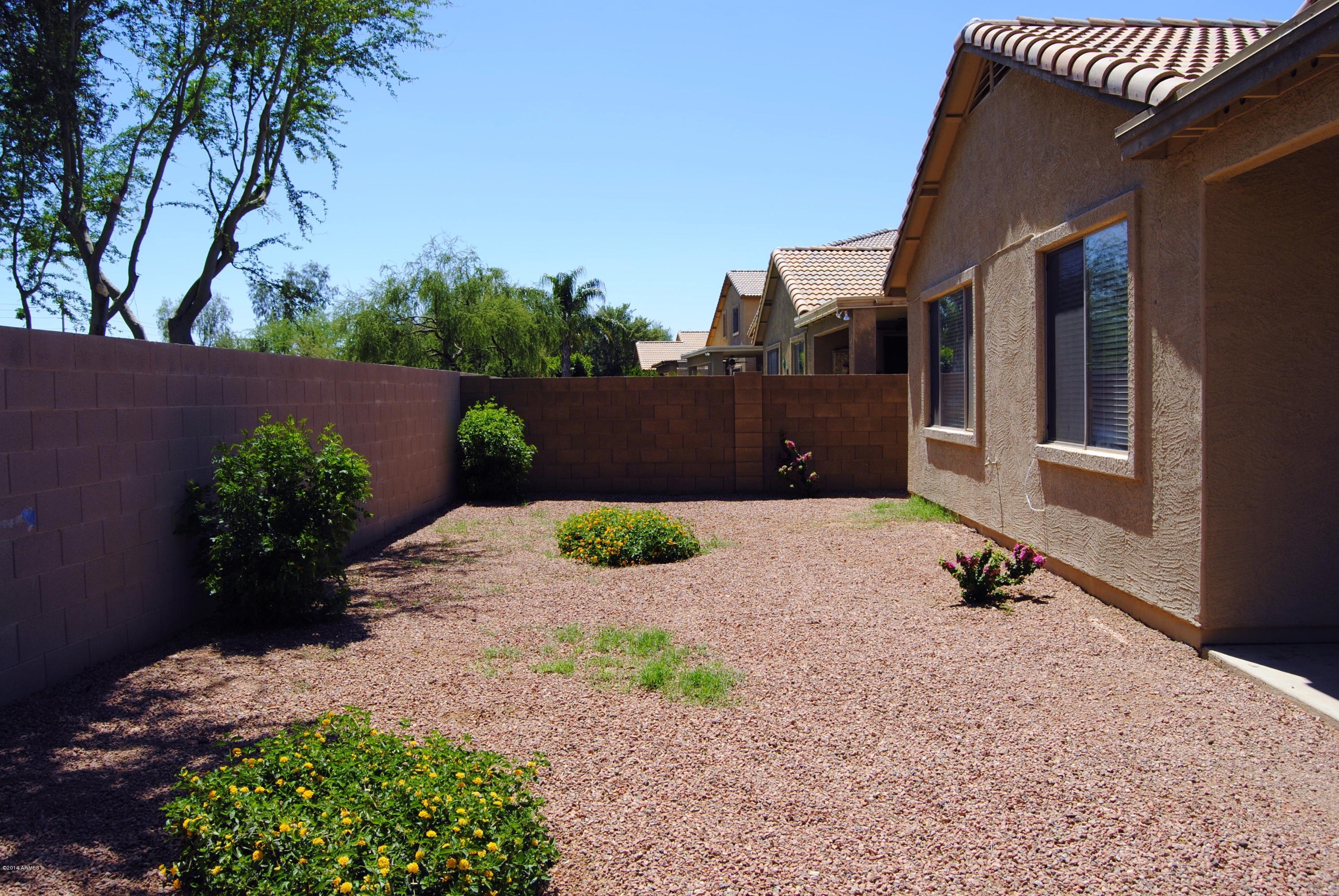 15941 West Calavar Road Surprise, AZ 85379 - Photo 18 of 22 Easy Care Backyard w NO NEIGHBORS BEHIND