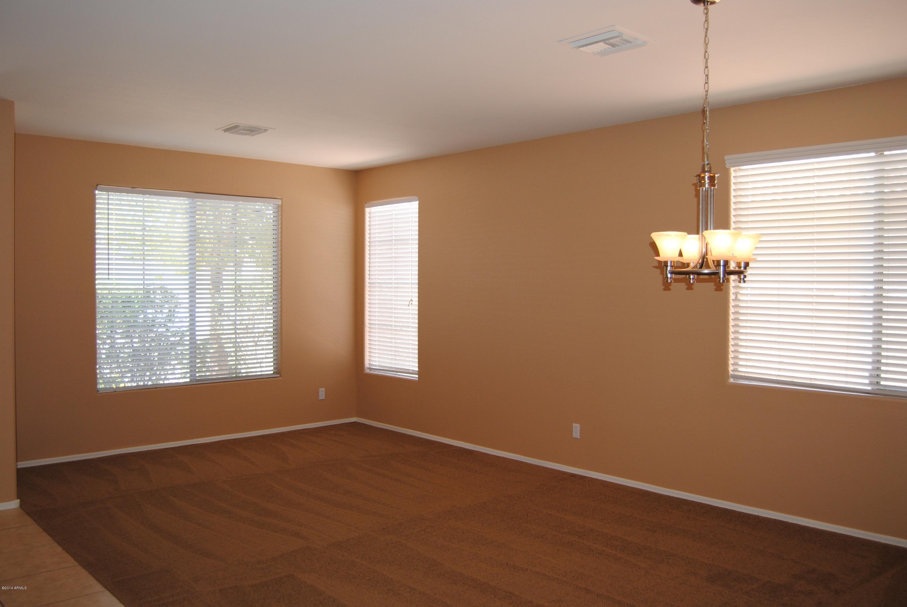 15941 West Calavar Road Surprise, AZ 85379 - Photo 2 of 22 Formal Living and Dining Room!