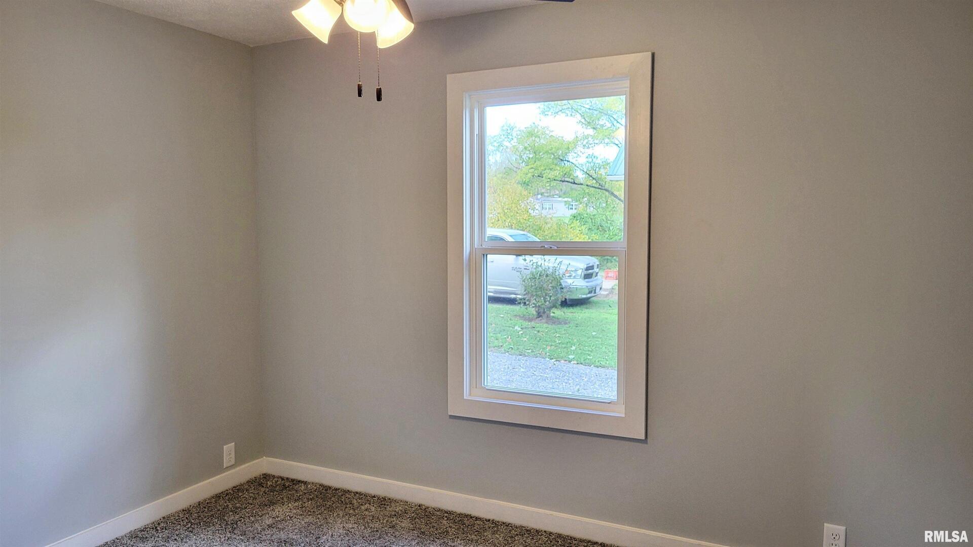 111 Wilmington Avenue Orient, IL 62874 - Photo 21 of 48 an empty room with a window