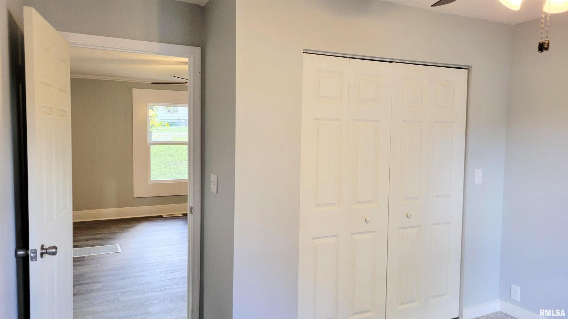 111 Wilmington Avenue Orient, IL 62874 - Photo 23 of 48 a view of a room with wooden floor