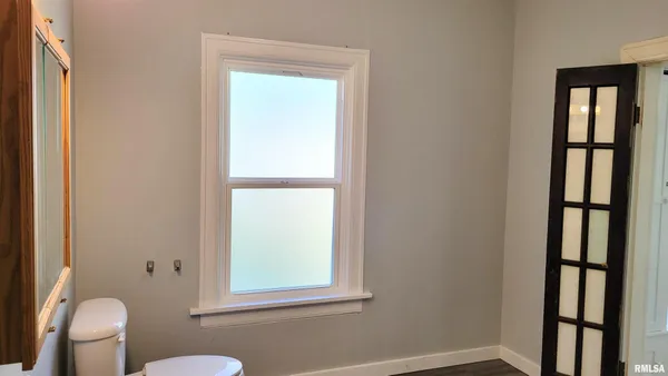 a bathroom with a toilet