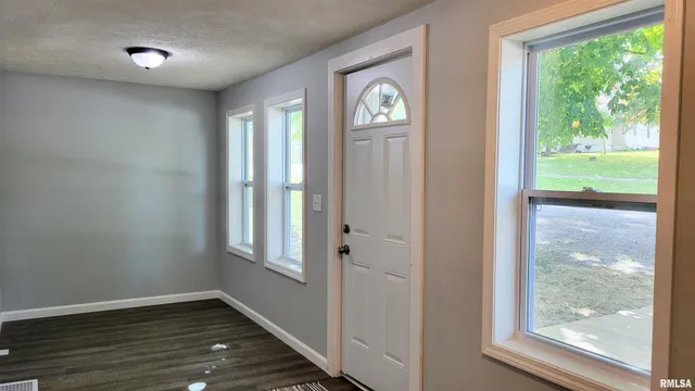 a view of hallway with front door