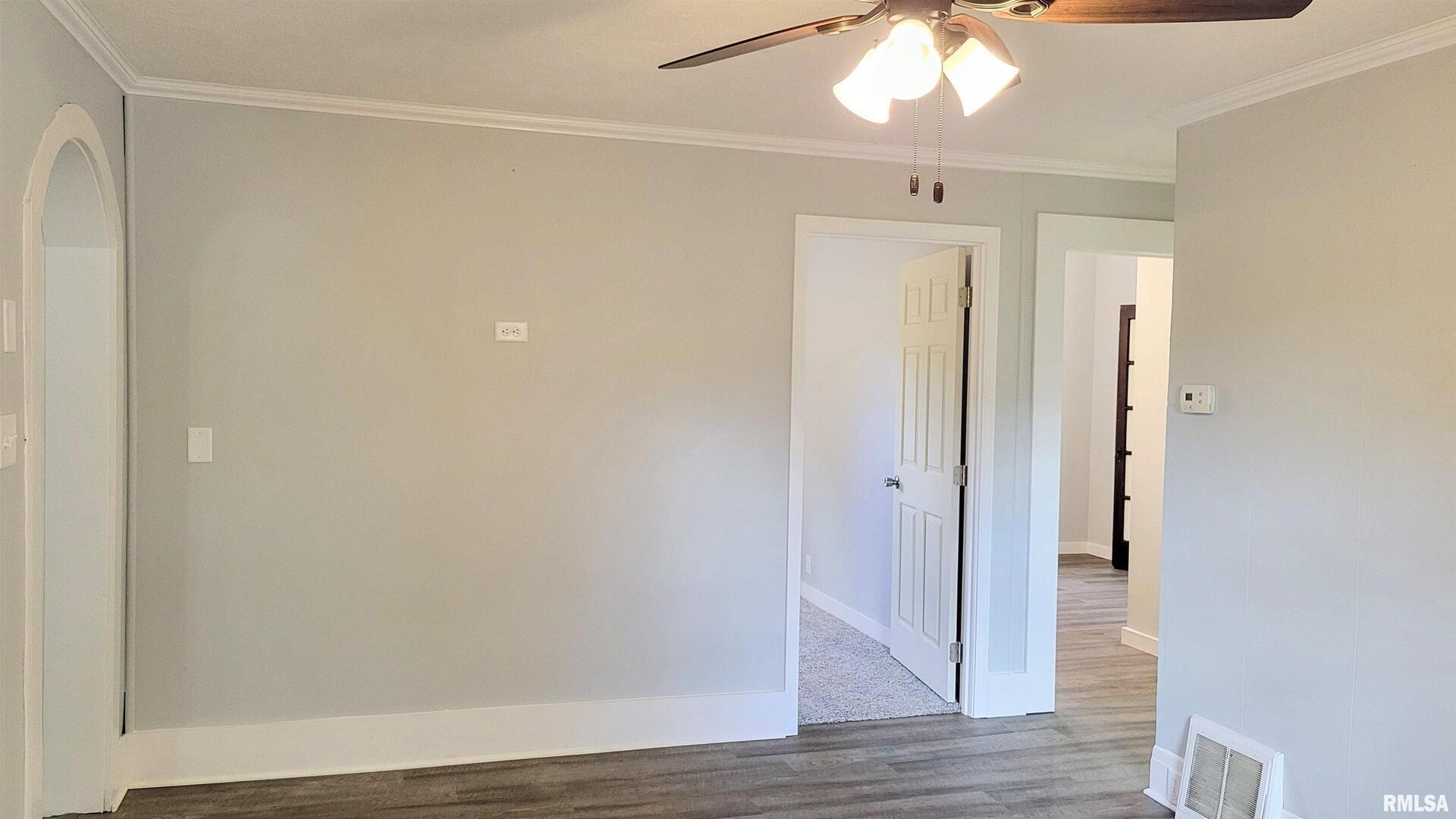 111 Wilmington Avenue Orient, IL 62874 - Photo 10 of 48 a view of a hallway with wooden floor