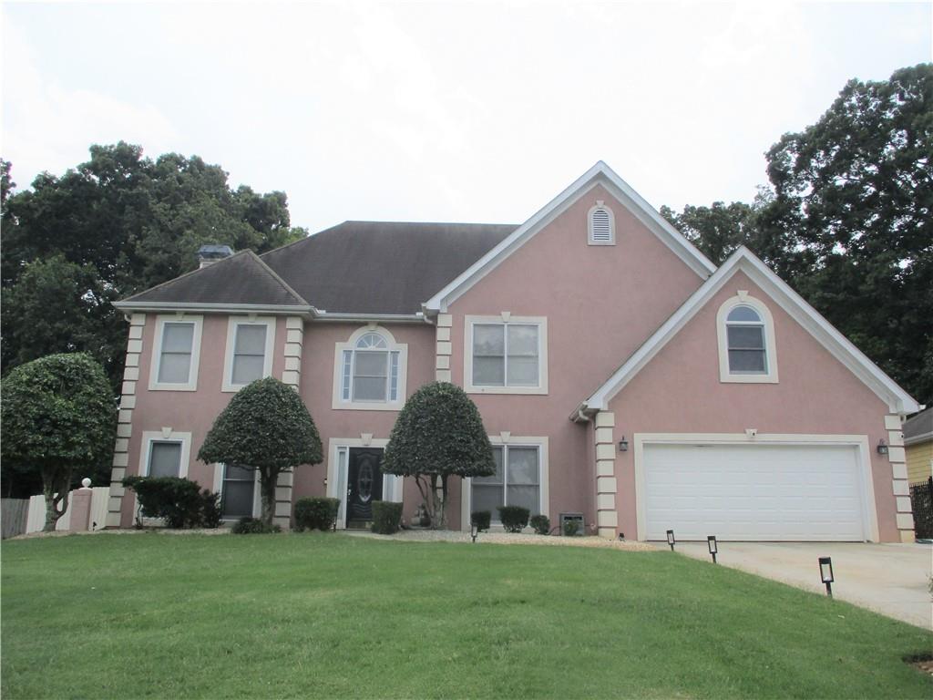 4149 Summit Crossing Drive Decatur, GA 30034 - Photo 1 of 1 a front view of house with yard and garage