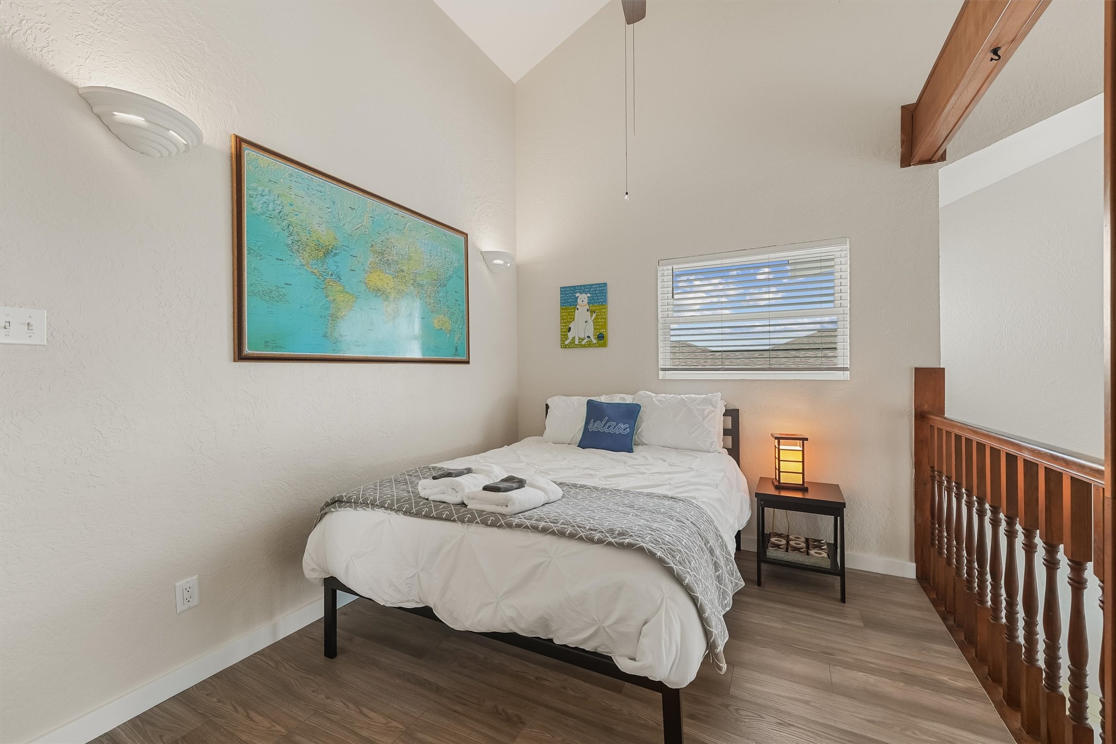 313 Schooner Drive Freeport, TX 77541 - Photo 11 of 30 a bedroom with a bed and wooden floor