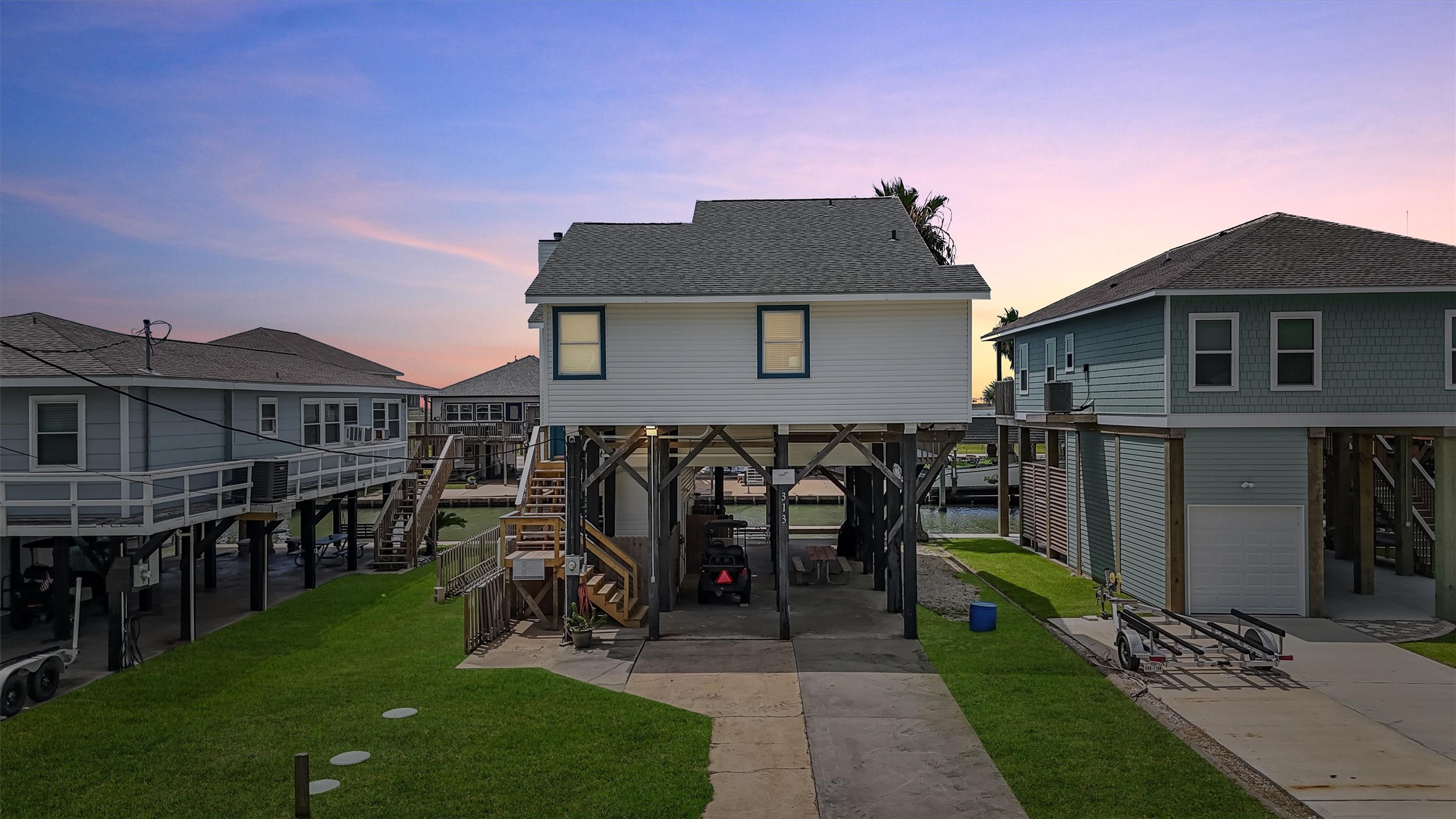 313 Schooner Drive Freeport, TX 77541 - Photo 26 of 30 a view of a house with a yard and plants