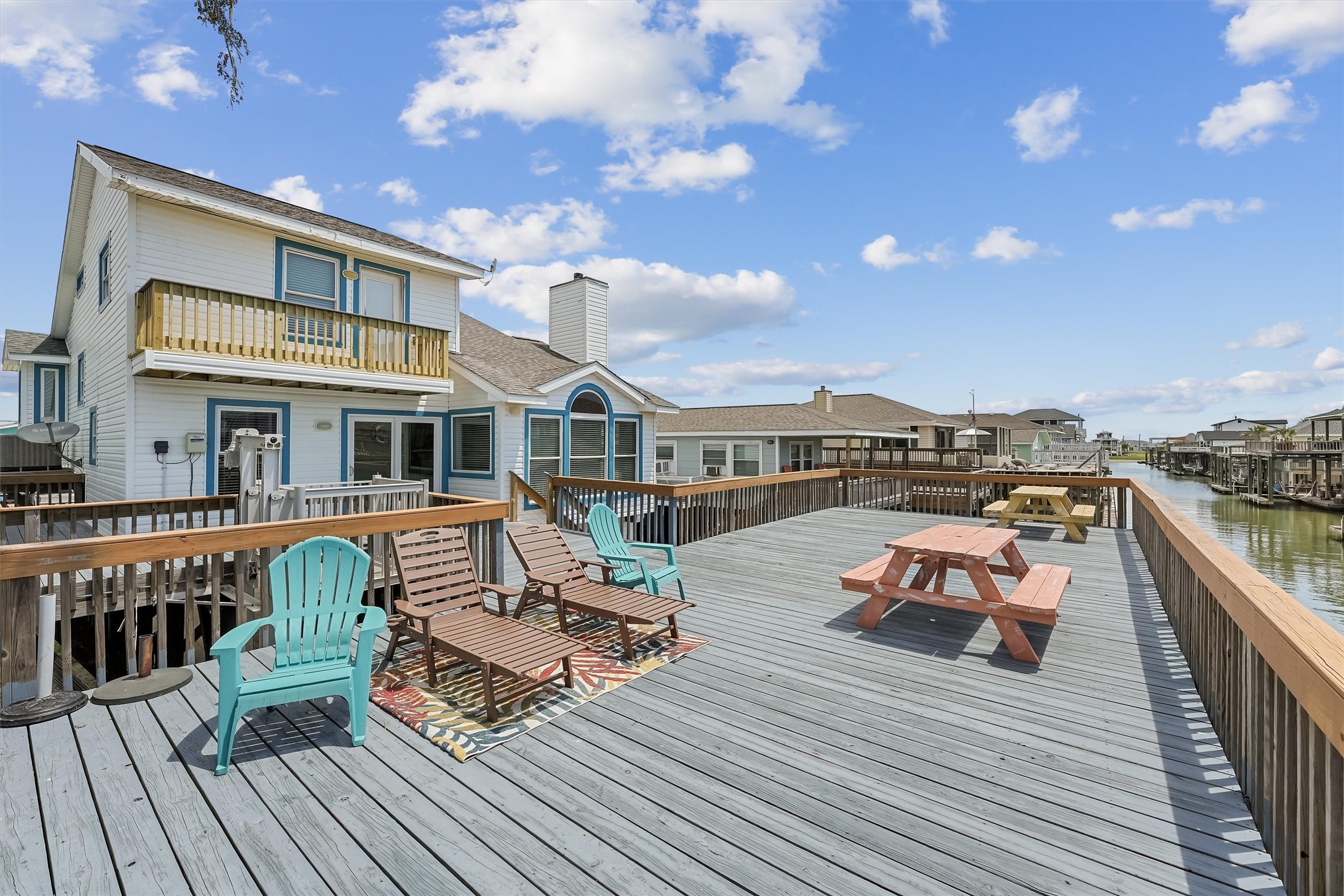 313 Schooner Drive Freeport, TX 77541 - Photo 3 of 30 a roof deck with table and chairs