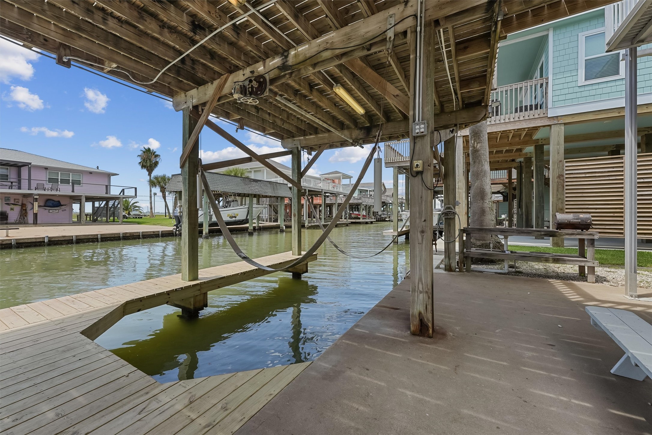 313 Schooner Drive Freeport, TX 77541 - Photo 4 of 30 a view of a house with swimming pool