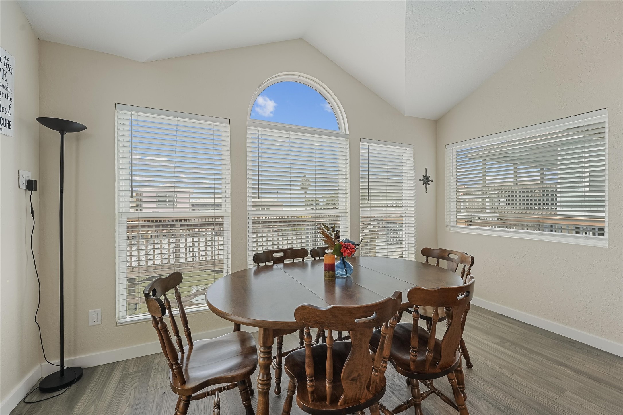 313 Schooner Drive Freeport, TX 77541 - Photo 10 of 30 a view of a dining room with furniture and windows