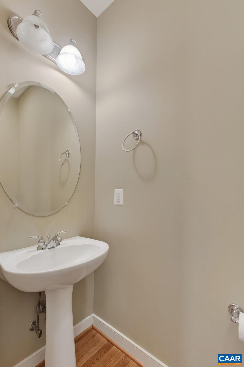 2138 Sundown Place Charlottesville, VA 22911 - Photo 21 of 38 a bathroom with a sink a mirror and shower