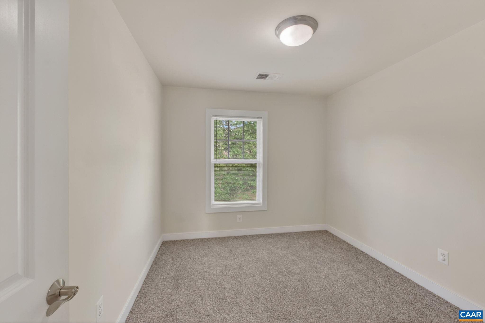 2138 Sundown Place Charlottesville, VA 22911 - Photo 29 of 38 an empty room with a window