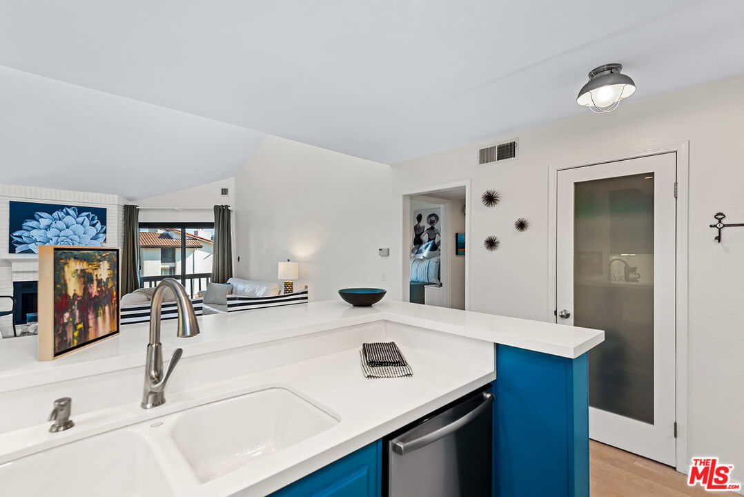 8600 Tuscany Avenue, Unit 419 Playa del Rey, CA 90293 - Photo 5 of 35 a bathroom with a sink and a mirror