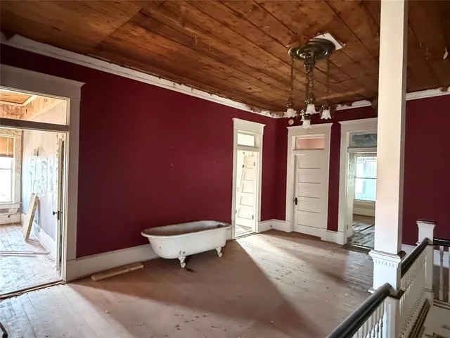 a bathroom with a toilet a sink and shower
