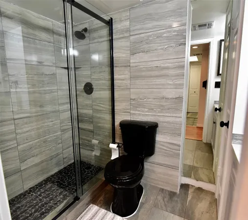 a bathroom with a sink and a shower
