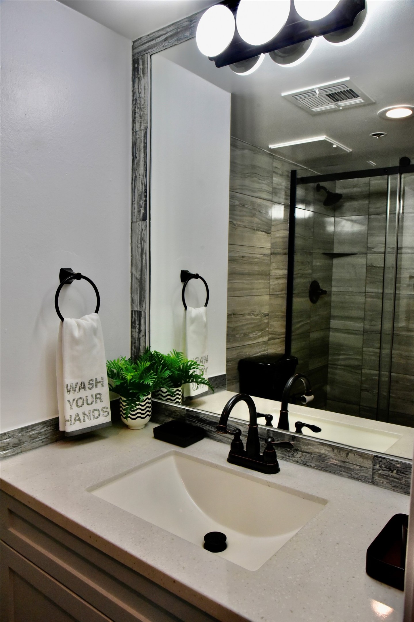 3525 Sage Road, Unit 701 Houston, TX 77056 - Photo 25 of 48 a bathroom with a sink and a mirror