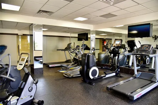 a view of a room with gym equipment