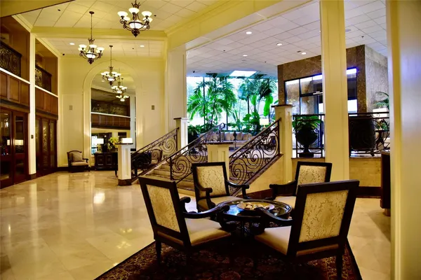 a view of a swimming pool with seating area