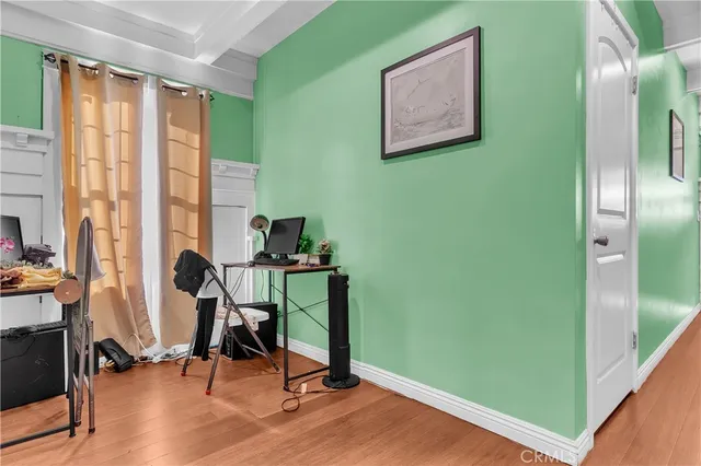 a hallway with wine glasses in front of it